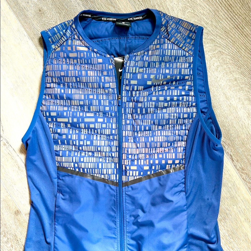Nike Aeroloft women’s reflective vest, purple, size large, NWT!